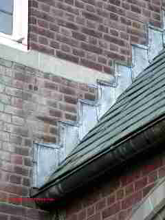 Step flashing slate to brick wall (C) Daniel Friedman
